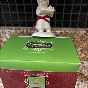 Celebrations Figurine with Red Accents